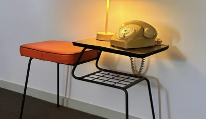orange phone on small table