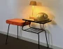 orange phone on small table
